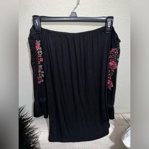 Charlotte Russe off the shoulder black women’s shirt.